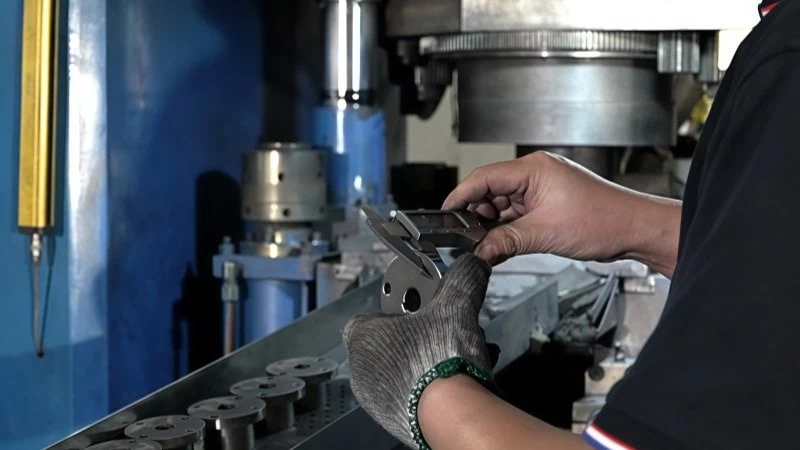 quality control inspection of machined powder metallurgy part using digital calipers