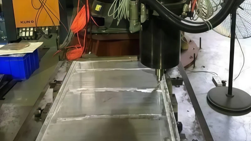close up of a cnc spindle milling an extruded aluminum workpiece